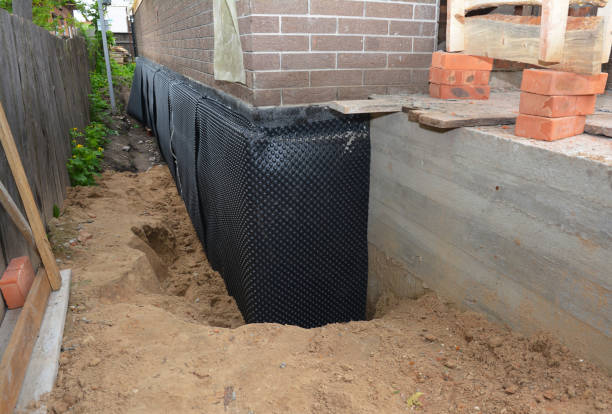 Happy homeowners after waterproofing job in Cuyahoga Falls